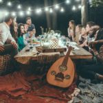 evening party with lights, friends, and guitar-Intermittent Fasting to lose weight